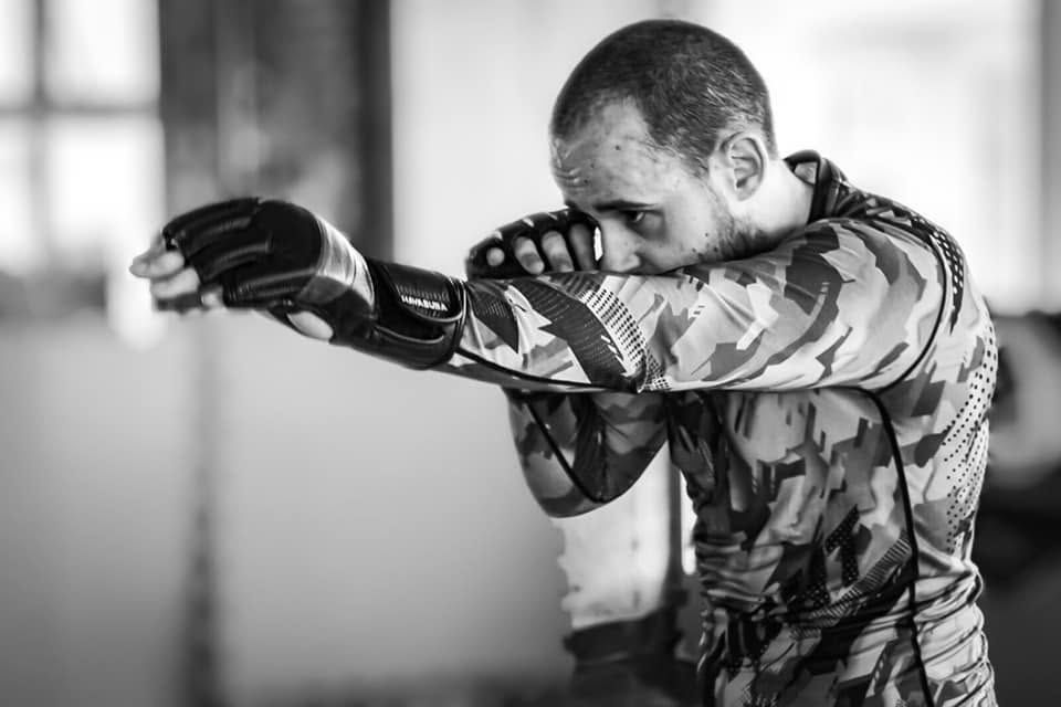 Kain shadowboxing, in black and white